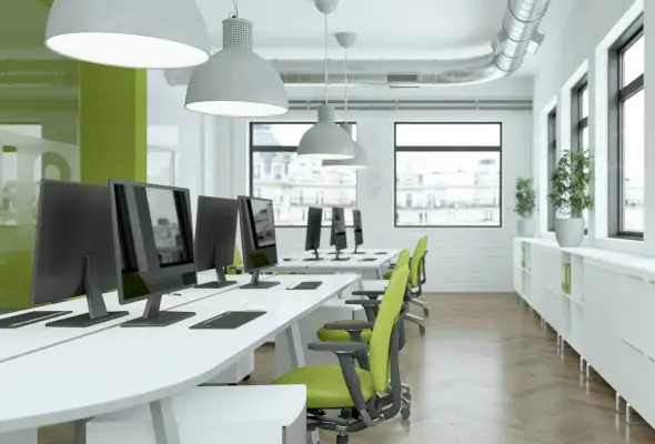Modern office workspace with computers and desks